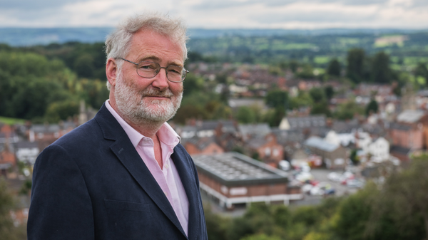 Cllr Richard Church standing above Welshpool